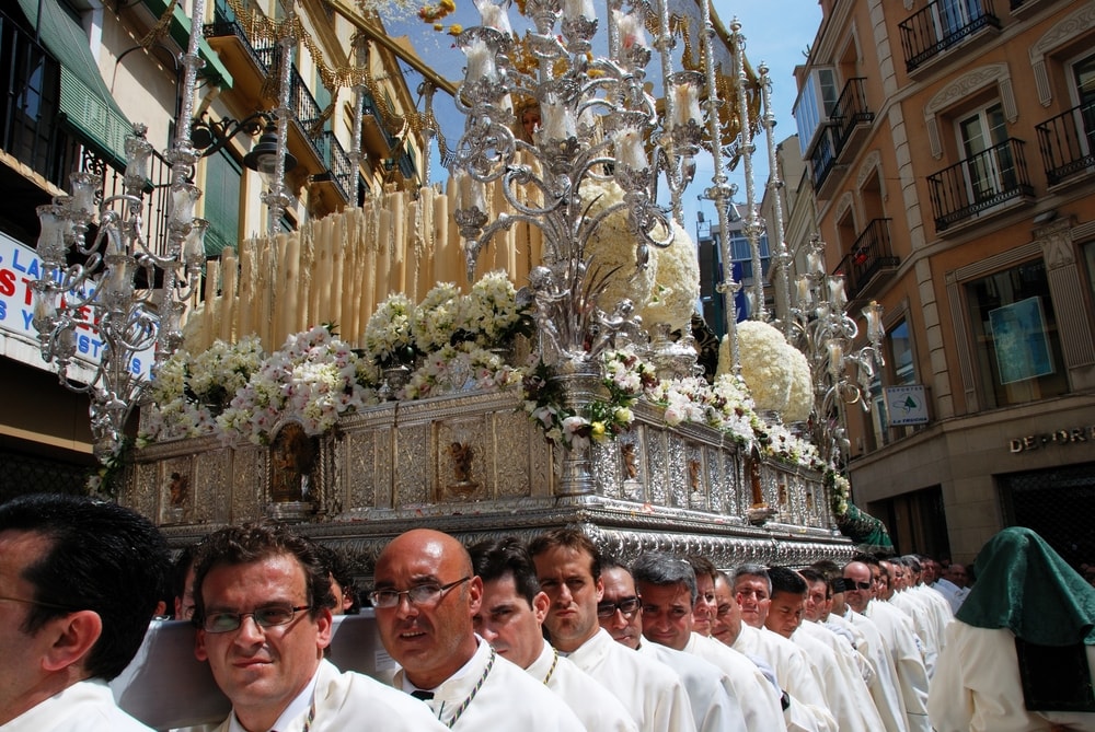 Brothers of Pollinica with throne of Virgin Mary in Malaga