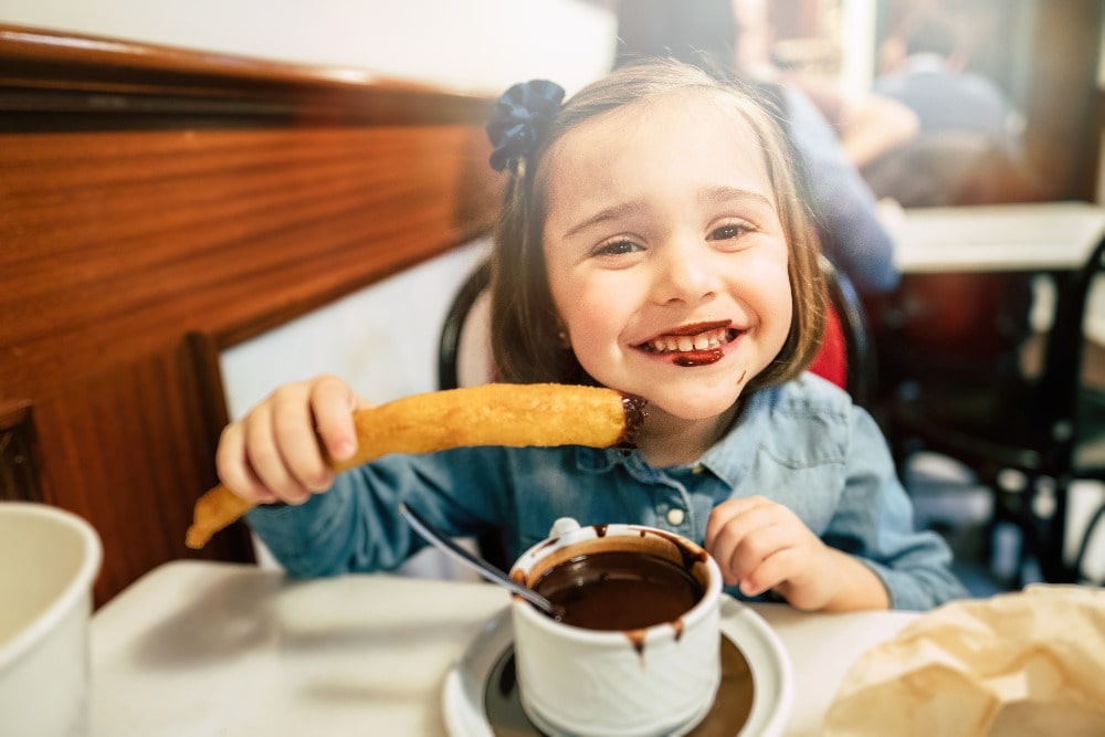 Eat churros in Malaga in January